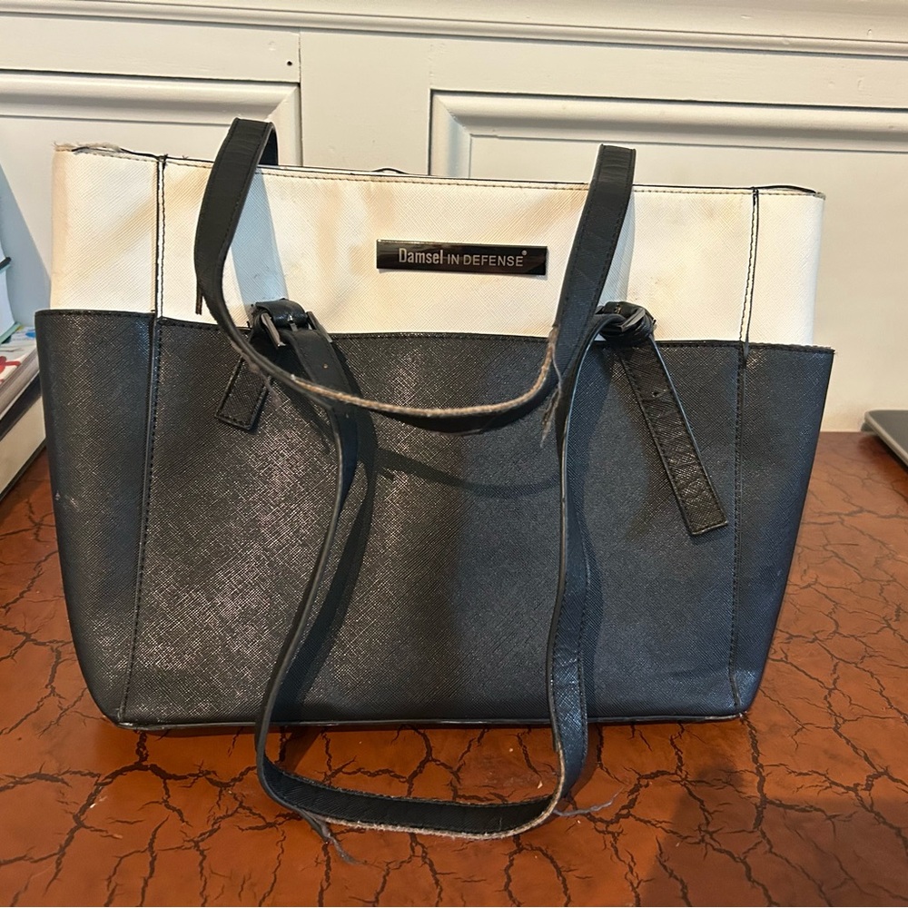 Black and White Damsel in Defense Tote Bag. This is a concealed carry bag.